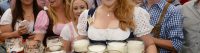 epa03876883 Waitress Beli carries the first beer jugs during the opening of the 180th Oktoberfest at the Theresienwiese in Munich, Germany, 21 September 2013. The annual beer folk festival runs until 06 October. EPA/FELIX HOERHAGER